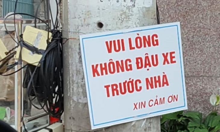 Đỗ ô tô trước cửa nhà người khác có bị xử phạt không?