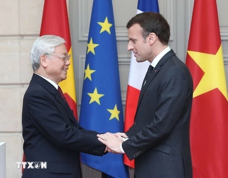 Tổng Bí thư Nguyễn Phú Trọng và Tổng thống Pháp Emmanuel Macron chiều 27-3-2018 tại Paris. Ảnh: TTXVN