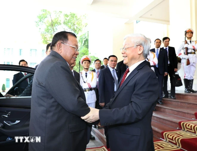 Sáng 3/7/2018, tại Trụ sở Trung ương Đảng, Tổng Bí thư Nguyễn Phú Trọng đón và hội đàm với Tổng Bí thư, Chủ tịch nước Lào Bounnhang Vorachith. (Ảnh: Trí Dũng/TTXVN)