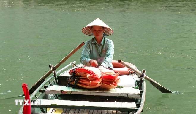 Bà Nguyễn Thị Dư đã vinh dự hai lần được đón, đưa Tổng Bí thư Nguyễn Phú Trọng đi thăm Khu du lịch. (Ảnh: Thùy Dung/TTXVN)