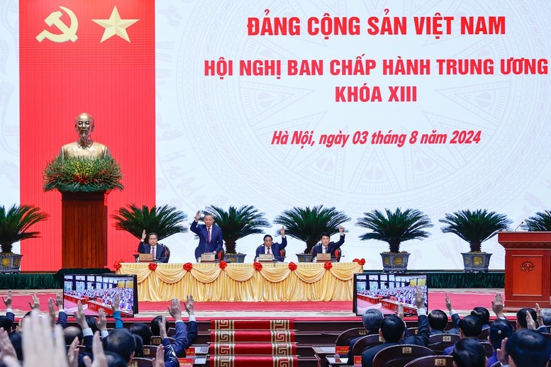 Các đại biểu biểu quyết thông qua chương trình làm việc - Ảnh: VGP/Nhật Bắc