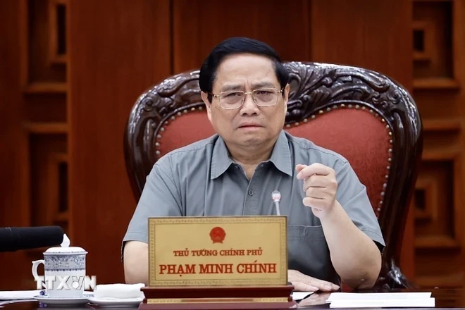 Thủ tướng Phạm Minh Chính chủ trì họp Thường trực Chính phủ về bảo đảm cung ứng điện, năng lượng. (Ảnh: Dương Giang/TTXVN)