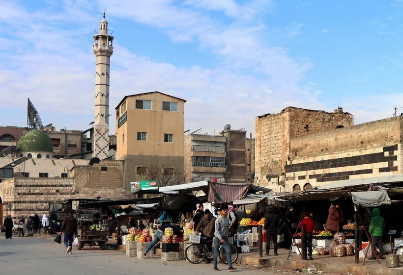 Người dân tại một khu chợ ở Hama, Syria. (Ảnh: THX/TTXVN)