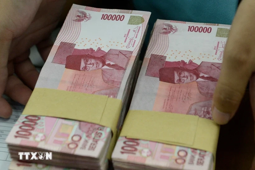 Đồng rupiah của Indonesia. (Ảnh: AFP/TTXVN)