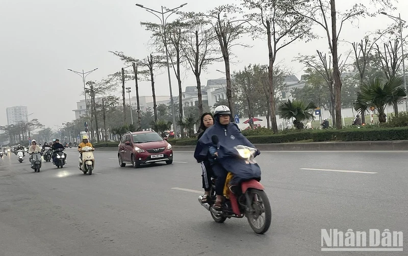 Hà Nội trời rét đậm và có mưa phùn. Ảnh: ĐT