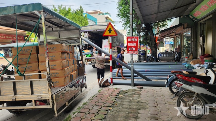 Nhờ được vận động, tuyên truyền, giải thích chính sách kịp thời, hầu hết tiểu thương tại Thổ Tang (Vĩnh Tường, Vĩnh Phúc) đã hoạt động trở lại. Ảnh: PHƯƠNG HIỀN
