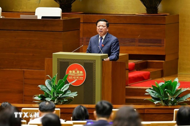 Bộ trưởng Bộ Xây dựng Trần Hồng Minh phát biểu giải trình, làm rõ một số vấn đề đại biểu Quốc hội nêu. (Ảnh: Doãn Tấn/TTXVN)