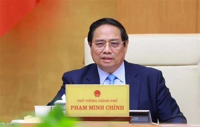 PM Pham Minh Chinh speaks at the meeting. (Photo: VNA)