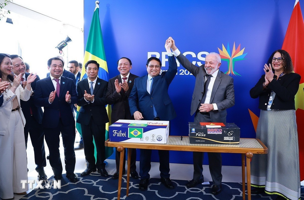 Thủ tướng Phạm Minh Chính và Tổng thống Brazil Lula da Silva tại lễ ký xuất khẩu hàng thương mại hai chiều giữa Việt Nam và Brazil. (Ảnh: Dương Giang/TTXVN)