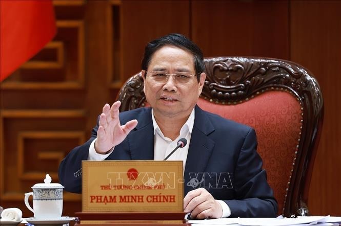范明政总理发言。图自越通社