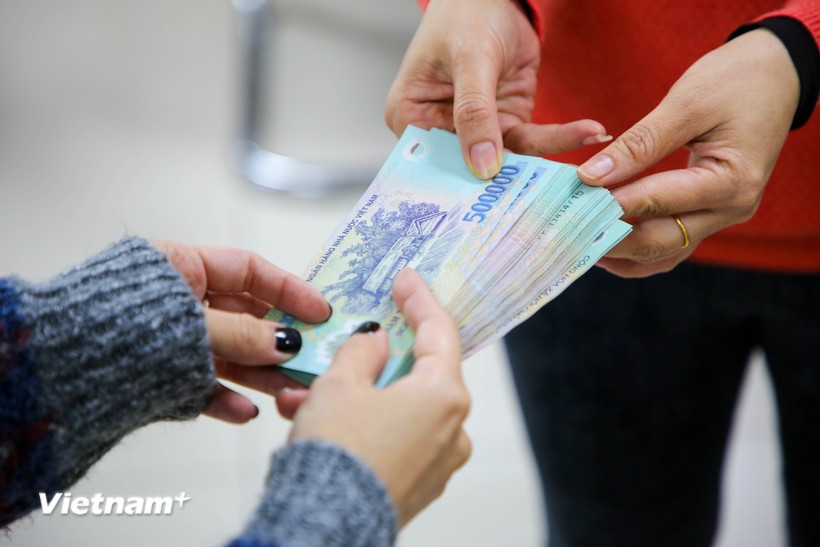 Bộ Nội vụ đang tiếp tục theo dõi, tổng hợp, hướng dẫn theo thẩm quyền việc thực hiện chế độ, chính sách quy định tại Nghị định số 178/2024/NĐ-CP. (Ảnh: PV/Vietnam+)