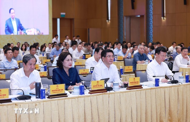 Các đại biểu tham dự Phiên họp lần thứ 3 Bản Chỉ đạo về phát triển khoa học, công nghệ, đổi mới sáng tạo, chuyển đổi số và Đề án 06. (Ảnh: Dương Giang/TTXVN)