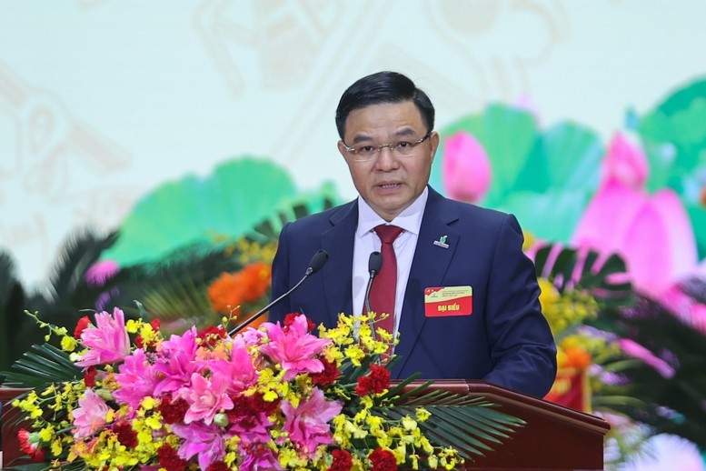Ông Lê Mạnh Hùng báo cáo tại Đại hội - Ảnh: VGP/Nhật Bắc