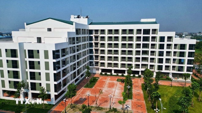 Vẫn còn nhiều khó khăn khi triển khai Đề án “Đầu tư xây dựng ít nhất 1 triệu căn nhà ở xã hội cho đối tượng thu nhập thấp, công nhân khu công nghiệp giai đoạn 2021- 2030” và cần giải pháp tháo gỡ của các cơ quan ban ngành. (Ảnh: Tuấn Anh/TTXVN)