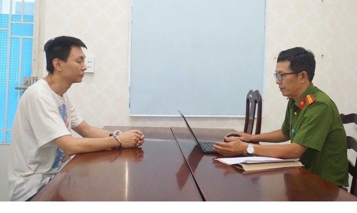 Bị can Nguyễn Thanh Nhã tại cơ quan Công an. (Ảnh: CACC)